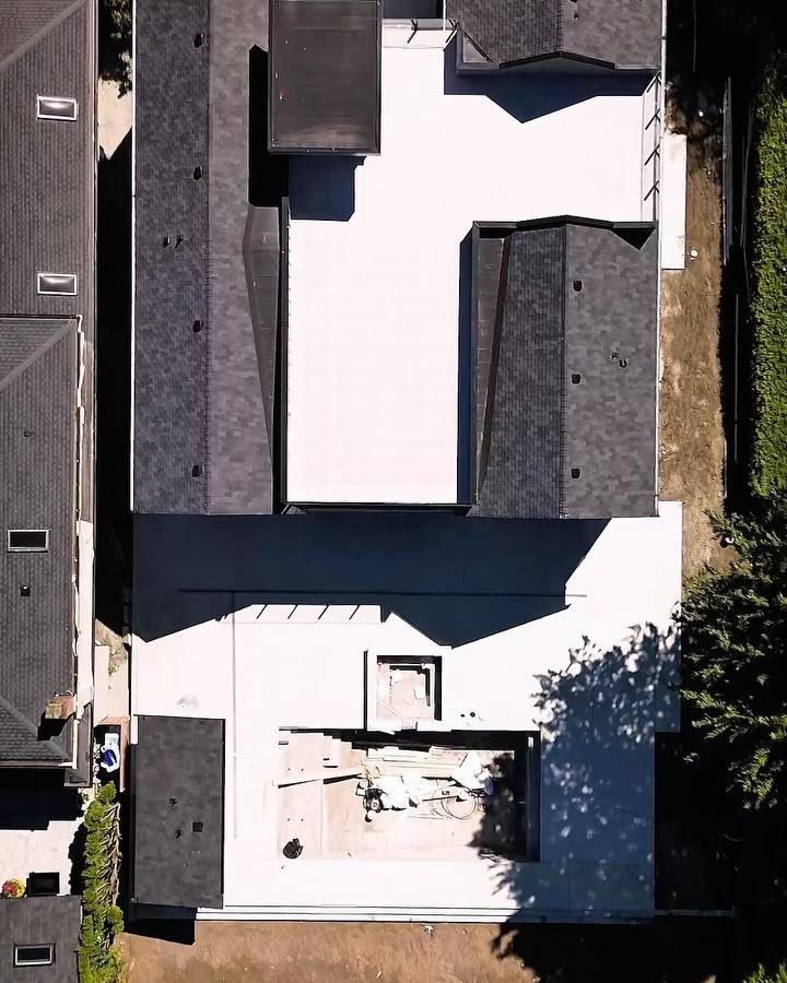 Aerial view of a home and yard during concrete work in Tsawwassen